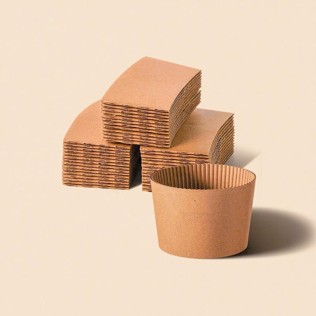 Stacked kraft paper cup sleeves showing their paper texture and construction
