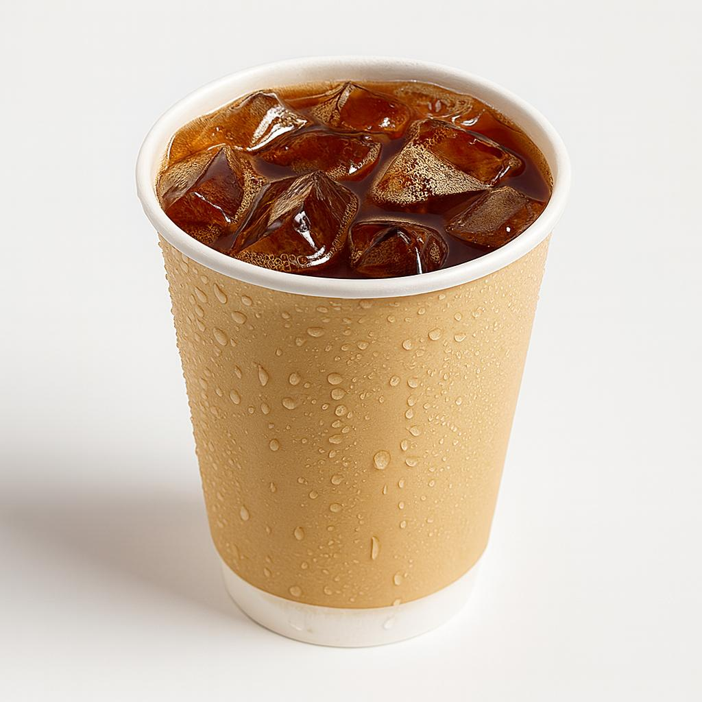 Paper cup with an iced beverage showing exterior moisture exposure